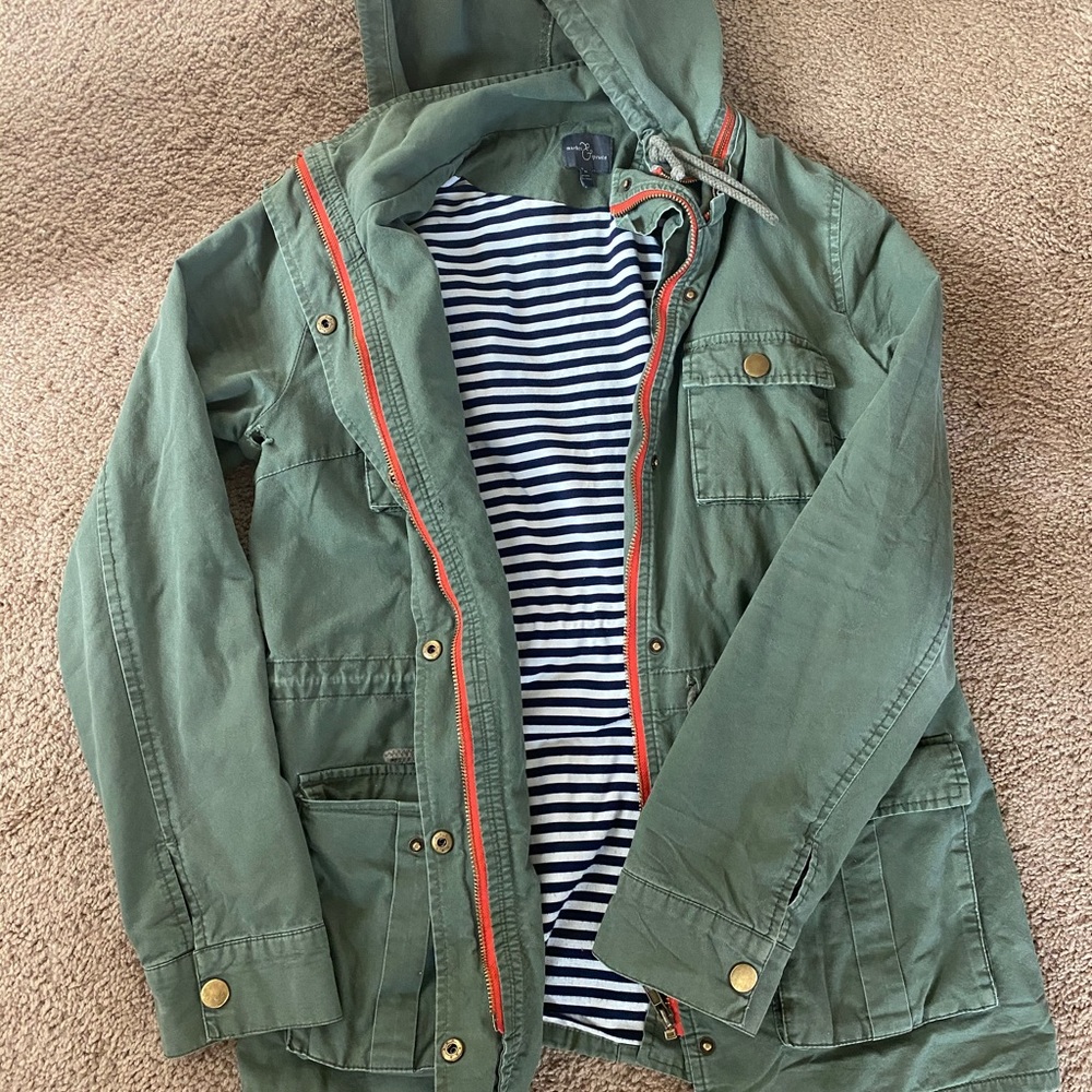 Light jacket. Small hole in armpit.